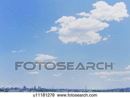 Stock Photo - Humilis and stratus clouds. Fotosearch