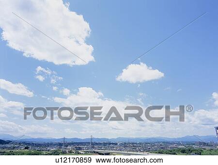 Stock Photo - Humilis and stratus clouds. Fotosearch