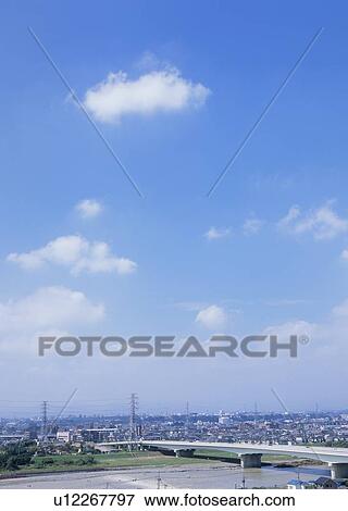 Stock Photo - Humilis and stratus clouds. Fotosearch