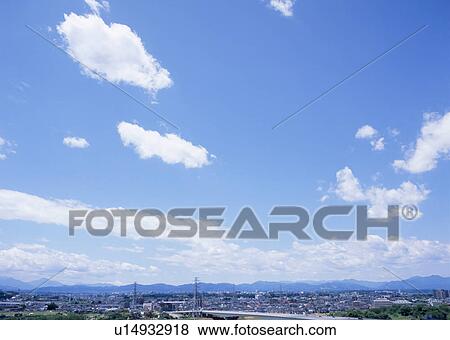 Stock Photo - Humilis and stratus clouds. Fotosearch