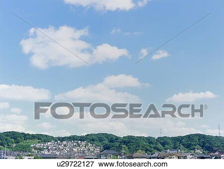 Stock Photo - Humilis and stratus clouds. Fotosearch