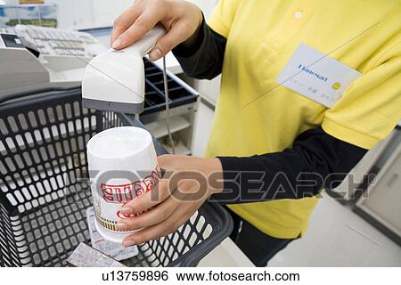 Barcode reader at convenience store View Large Photo Image Stock Photograph - Barcode reader at convenience store. Fotosearch
