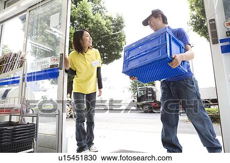 Convenience store clerk and Truck driver View Large Photo Image Stock Image - Convenience store clerk and Truck driver. Fotosearch