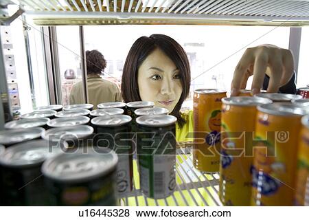 Convenience store clerk displaying View Large Photo Image Stock Photo - Convenience store clerk displaying. Fotosearch