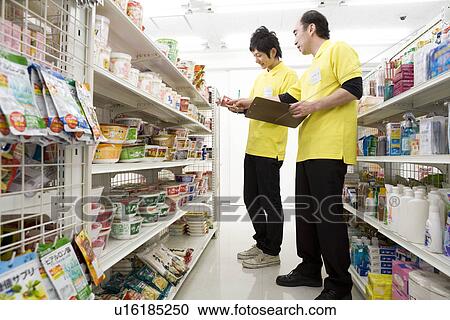 Convenience store clerk View Large Photo Image Stock Image - Convenience store clerk. Fotosearch