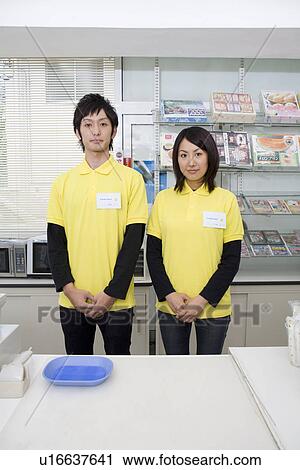 Convenience store clerk View Large Photo Image Stock Image - Convenience store clerk. Fotosearch