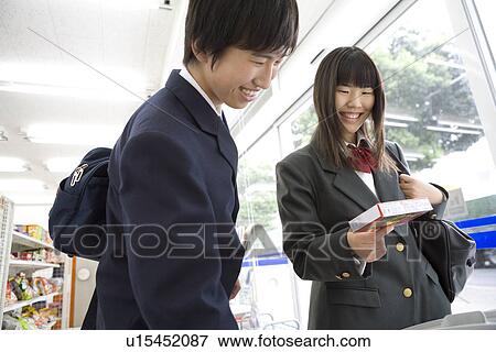Stock Photo - Customer at convenience store. Fotosearch