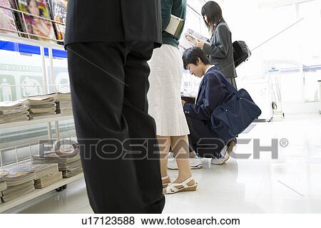 Customer at convenience store View Large Photo Image Stock Photo - Customer at convenience store. Fotosearch