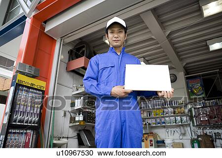 Mechanic standing View Large Photo Image Stock Image - Mechanic standing. Fotosearch