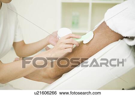 Massage therapist applying depilatory View Large Photo Image Stock Photograph - Massage therapist applying depilatory. Fotosearch