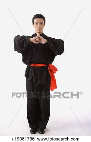 Man showing the Kung Fu Gates pose for attacking an opponent View Large Photo Image Stock Photograph - Man showing the Kung Fu Gates pose for attacking an opponent. Fotosearch
