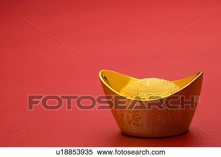 Stock Photography - A bowl full of gold coins. Fotosearch
