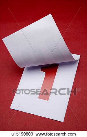 Stock Image - Calendar papers with red background. Fotosearch