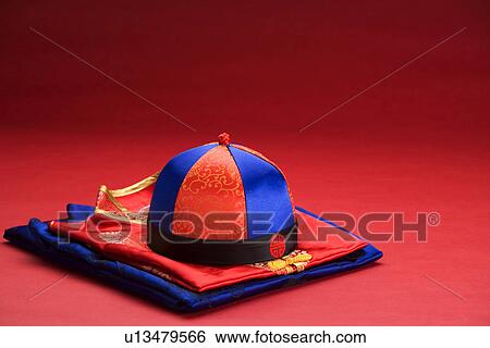 Chinese traditional cap and clothes View Large Photo Image Stock Photograph - Chinese traditional cap and clothes. Fotosearch