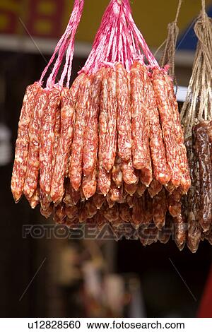Close-up of hanged preserved sausage View Large Photo Image Stock Image - Close-up of hanged preserved sausage. Fotosearch
