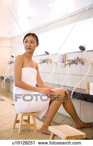 Young woman in bath room sitting View Large Photo Image Stock Image - Young woman in bath room sitting. Fotosearch