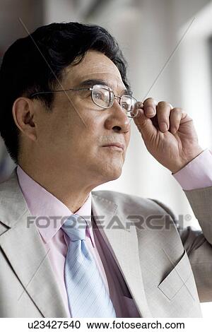 Businessman in glasses, portrait View Large Photo Image Stock Image - Businessman in glasses, portrait. Fotosearch