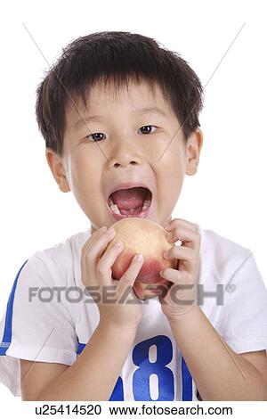 Boy about to eating peach View Large Photo Image Stock Image - Boy about to eating peach. Fotosearch