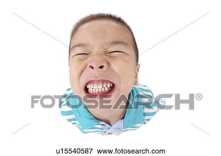 Stock Photo - Boy, high angle view, portrait, close-up. Fotosearch