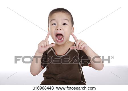 Boy, portrait, close up View Large Photo Image Stock Image - Boy, portrait, close up. Fotosearch