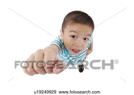 Boy punching the air, portrait, close up View Large Photo Image Stock Photo - Boy punching the air, portrait, close up. Fotosearch