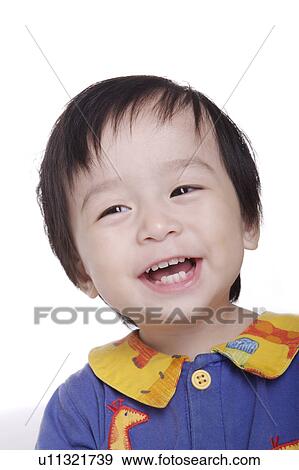 Stock Photo - Girl smiling, portrait. Fotosearch