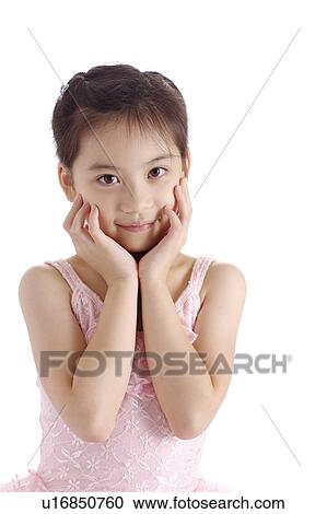 Stock Image - Girl with hands on chin. Fotosearch
