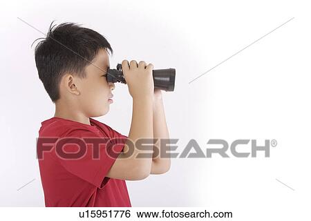 Boy looking with telescope, side view, portrait View Large Photo Image Stock Photograph - Boy looking with telescope, side view, portrait. Fotosearch