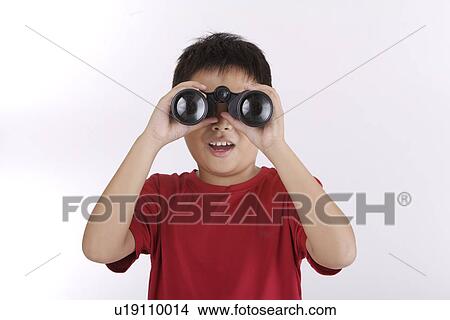 Picture - Boy using telescope, portrait. Fotosearch