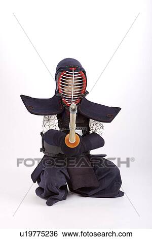 Boy wearing kendo uniform holding fencing foil, portrait View Large Photo Image Stock Photograph - Boy wearing kendo uniform holding fencing foil, portrait. Fotosearch