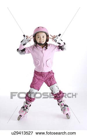 Girl in roller skate and sports helmet, portrait View Large Photo Image Stock Photo - Girl in roller skate and sports helmet, portrait. Fotosearch