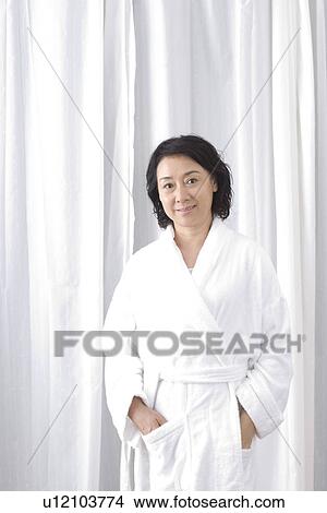 Senior woman in bathrobe, close up, portrait View Large Photo Image Picture - Senior woman in bathrobe, close up, portrait. Fotosearch