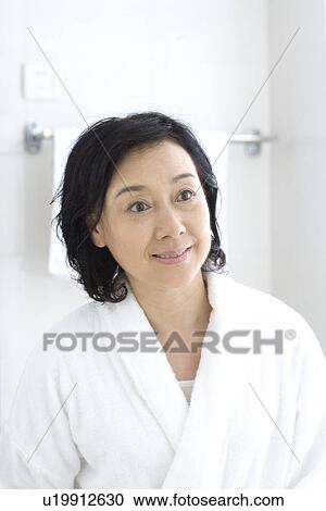 Senior woman in bathroom, portrait View Large Photo Image Stock Image - Senior woman in bathroom, portrait. Fotosearch
