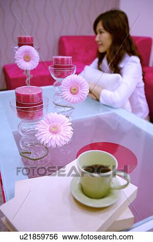 Stock Photograph - Young woman in home. Fotosearch