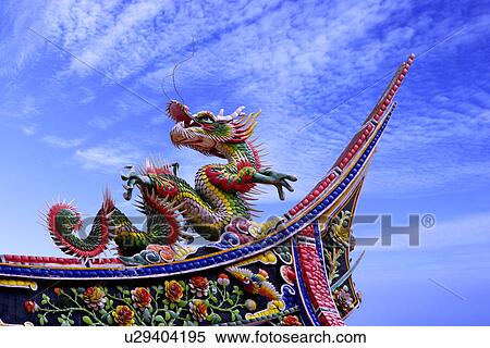 Stock Photography - Asia, Taiwan, Citian Temple, Ornate roof with dragon. Fotosearch