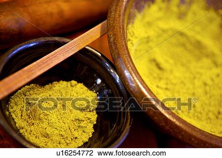 Stock Image - Asia, Taiwan, Grinding Tea. Fotosearch