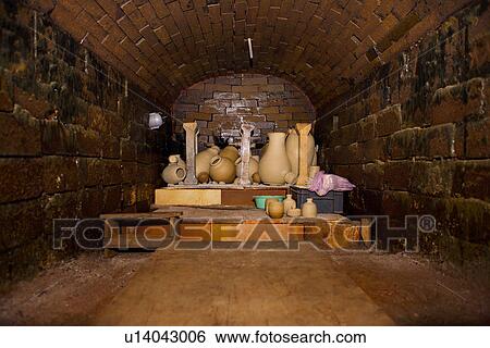 Stock Photograph - Assorted potteries in ceramic kiln. Fotosearch