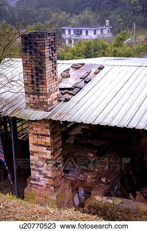 Stock Image - Ceramic kiln chimney, close up. Fotosearch