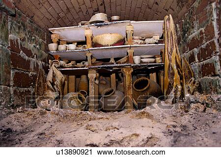 Stock Image - Ceramic pots after opening kiln. Fotosearch