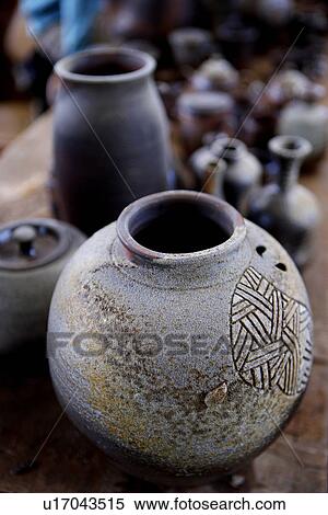 Ceramic pots, one pot with decal in foreground View Large Photo Image Stock Photography - Ceramic pots, one pot with decal in foreground. Fotosearch