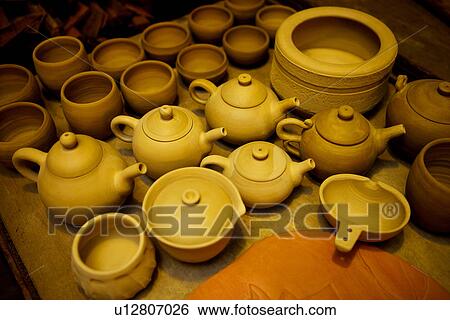 Stock Photograph - Clay bodies prepared for firing. Fotosearch