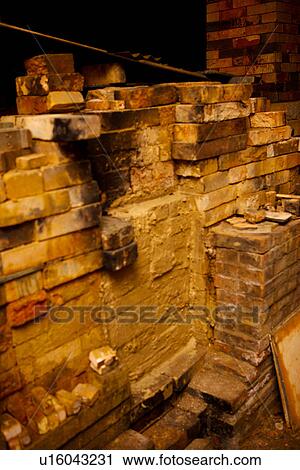 Stock Image - Kiln entrance made of brick wall. Fotosearch