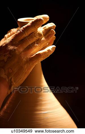Stock Photo - Pinching a vase. Fotosearch