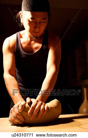 Potter pinching clay View Large Photo Image Stock Image - Potter pinching clay. Fotosearch