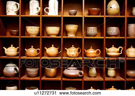 Pottery on shelf, close up View Large Photo Image Stock Image - Pottery on shelf, close up. Fotosearch