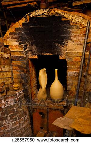 Two clay potteries placing in kiln's exit View Large Photo Image Stock Image - Two clay potteries placing in kiln's exit. Fotosearch