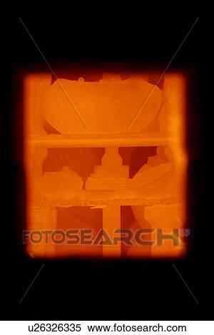 Stock Photography - View through ceramic kiln's inspection hole. Fotosearch