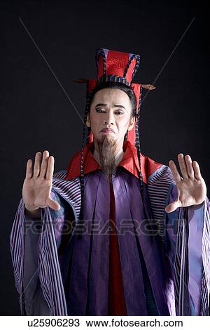 A man wearing traditional king clothing showing hands View Large Photo Image Stock Image - A man wearing traditional king clothing showing hands. Fotosearch