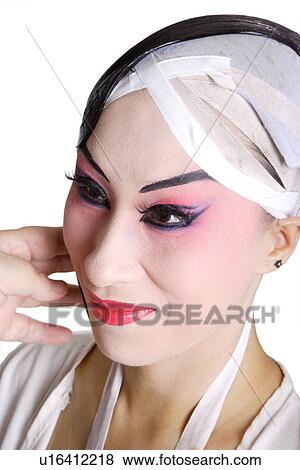 Stock Photo - Chinese traditional opera character dressing. Fotosearch