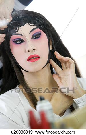 Stock Photo - Chinese traditional opera character dressing. Fotosearch